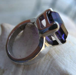 Just love that deep purple amethyst.  The basket setting is clunky and heavy to fit the massive stone.